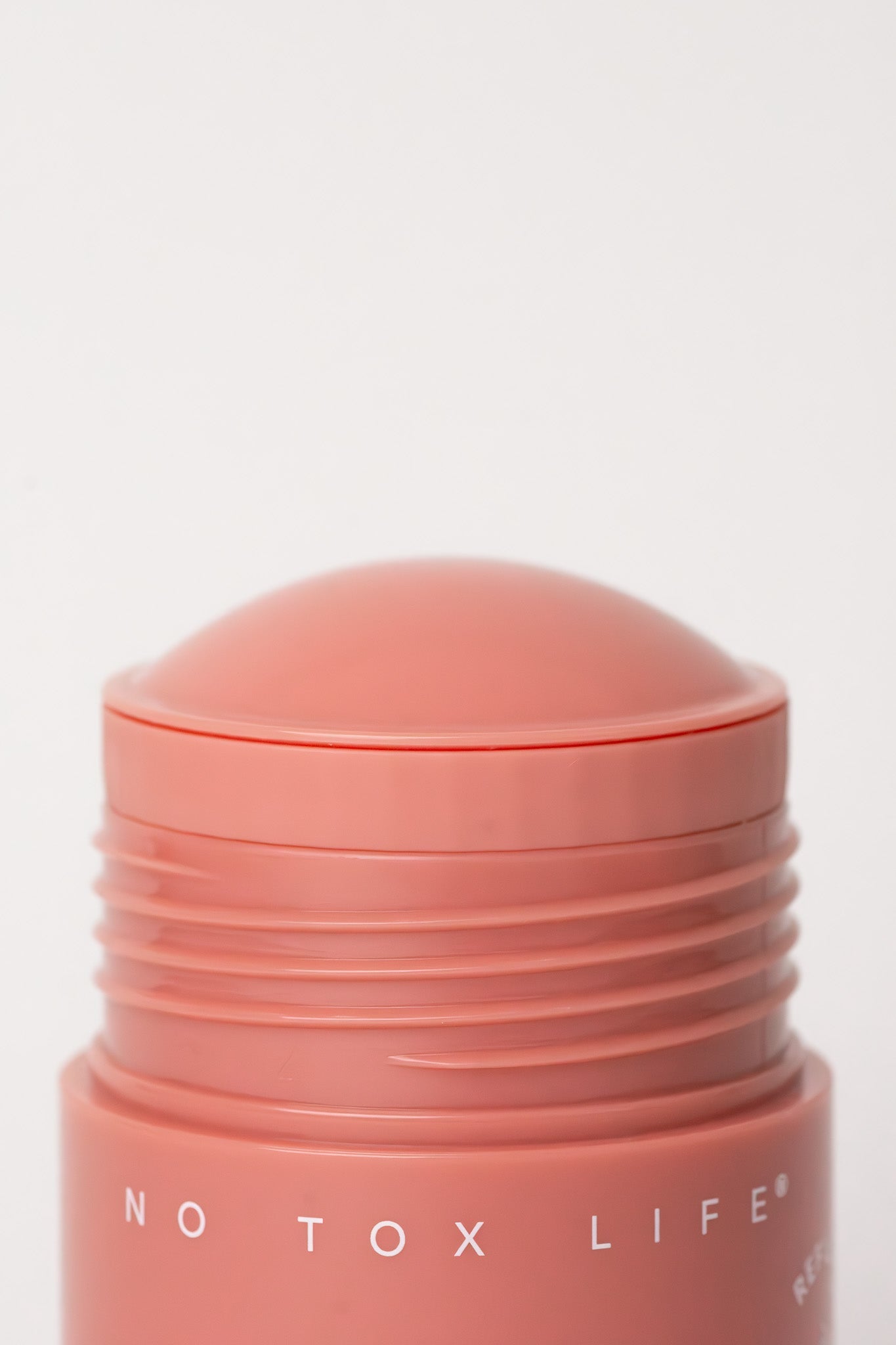 Refillable SOLIDSILK® deodorant stick in Desert Rose + Citrus scent by NO TOX LIFE, with sleek packaging and natural design.