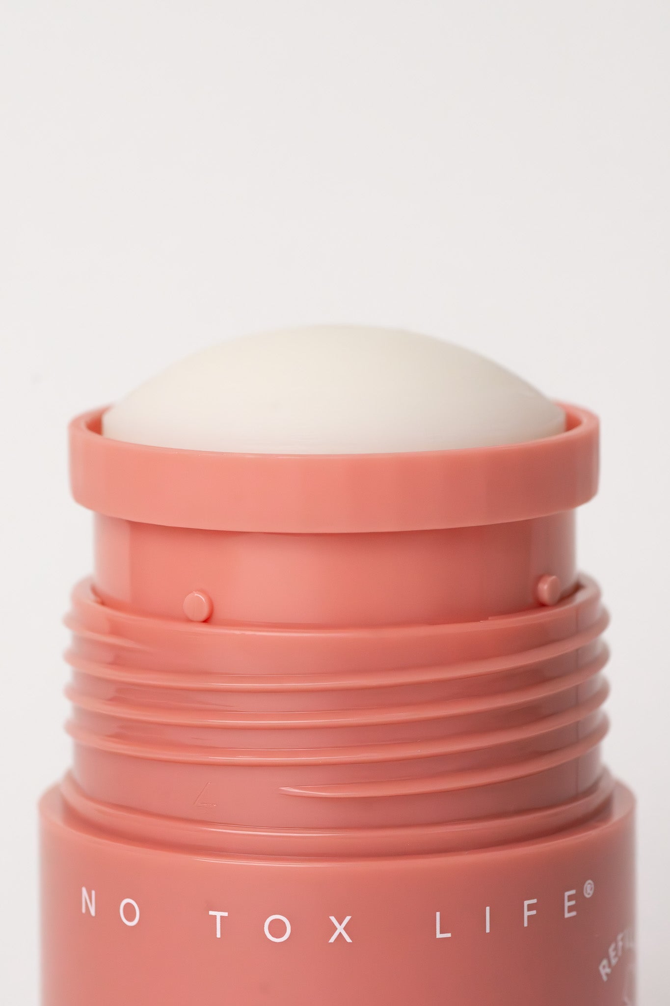 Refillable SOLIDSILK® deodorant in Desert Rose and Citrus, extra strength, by NO TOX LIFE, with a sleek natural container.