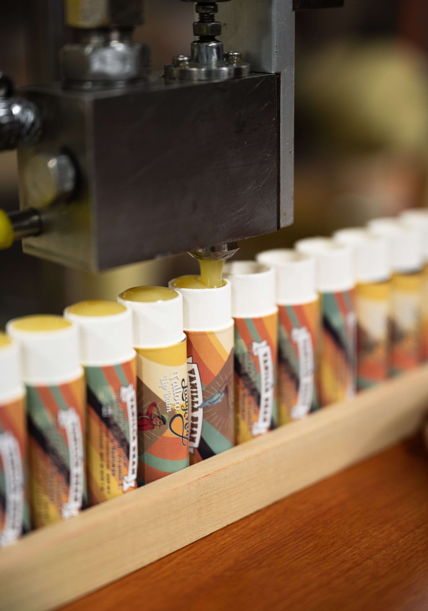 Lady May Tallow beef tallow lip balm tube with natural ingredients, showcasing the nourishing all-natural body lotion product.
