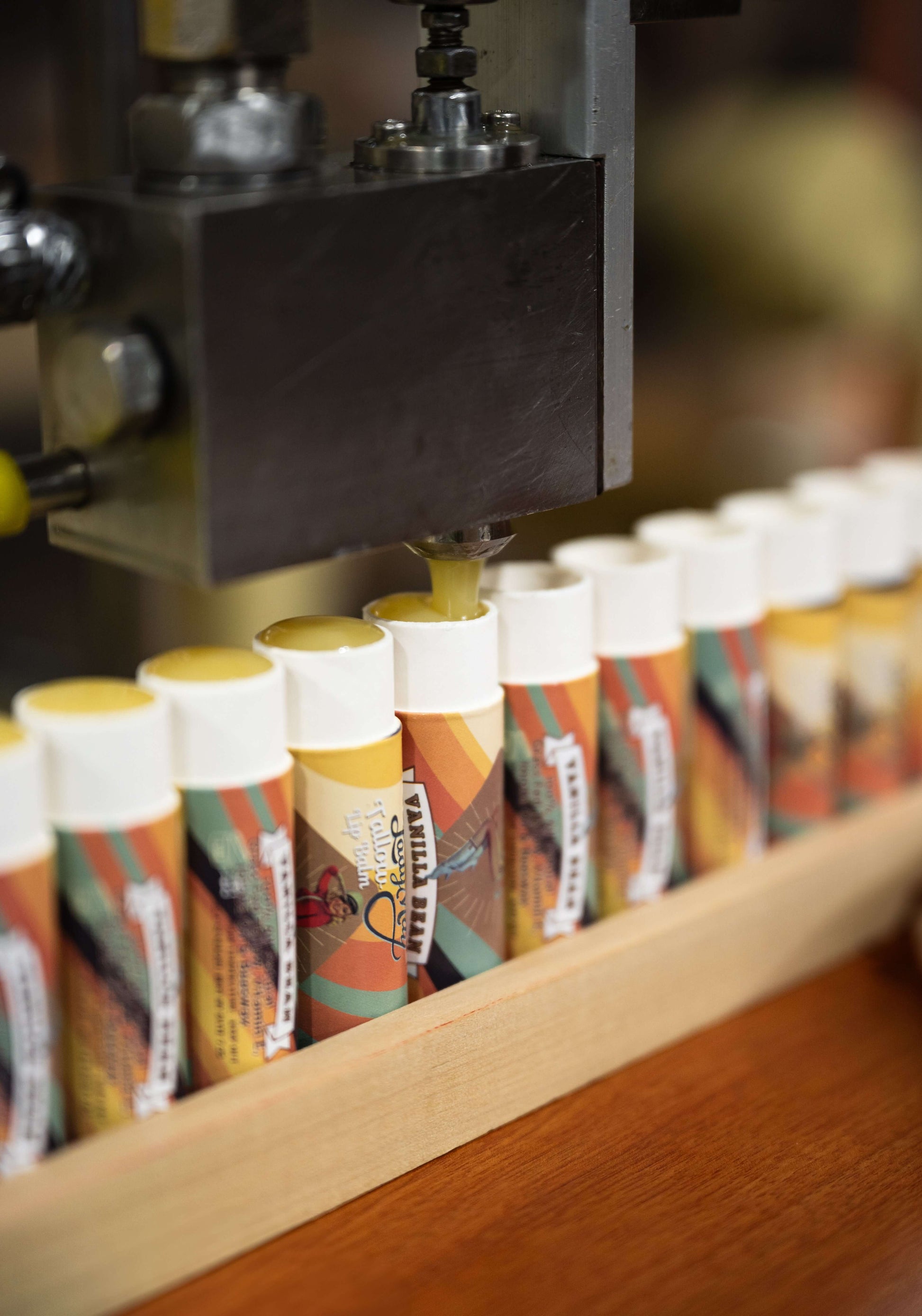 Lady May Tallow beef tallow lip balm tube with natural ingredients, showcasing the nourishing all-natural body lotion product.