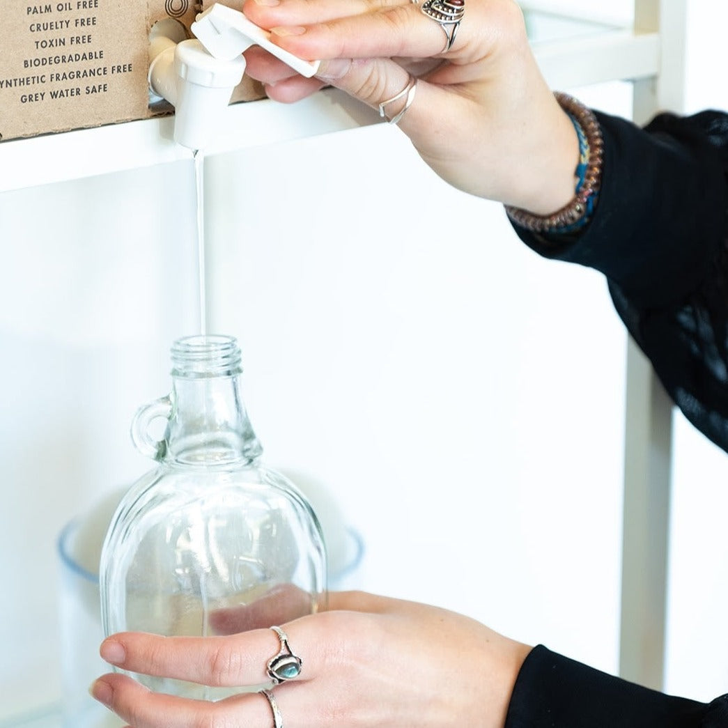 Liquid hand soap refill by Fillaree with a clear bottle and pump, labeled Soap & Suds, designed for home use.