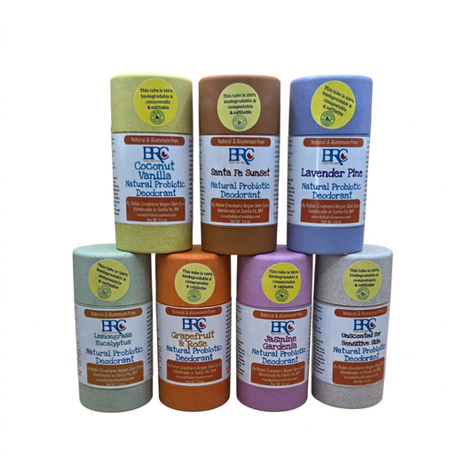 Group of natural probiotic deodorants by Robin Creations in new packaging, showing sleek bottles and labels for body care.