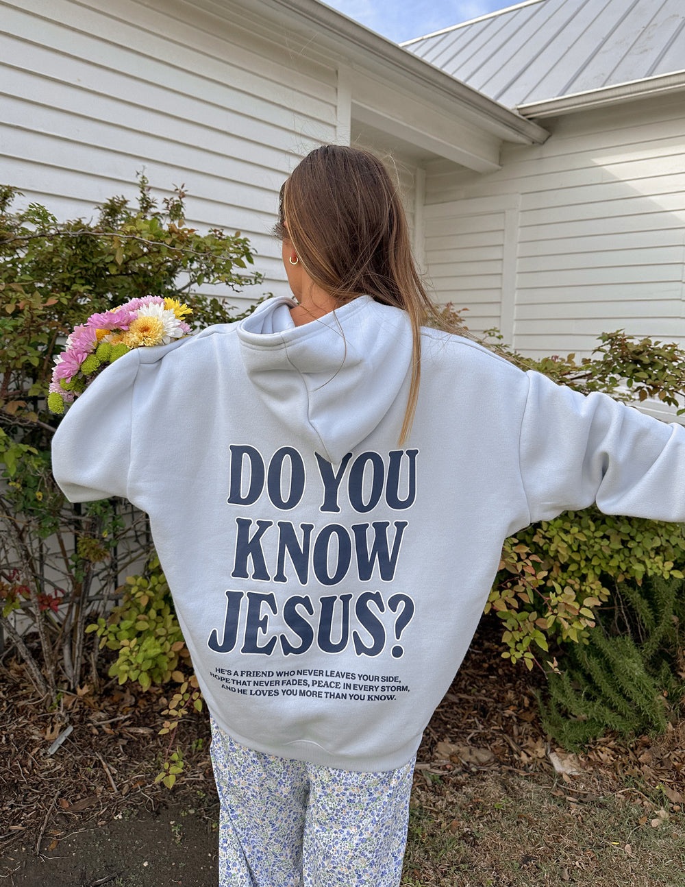 Unisex hoodie featuring religious text and design, branded Elevated Faith, in a casual style for everyday wear.