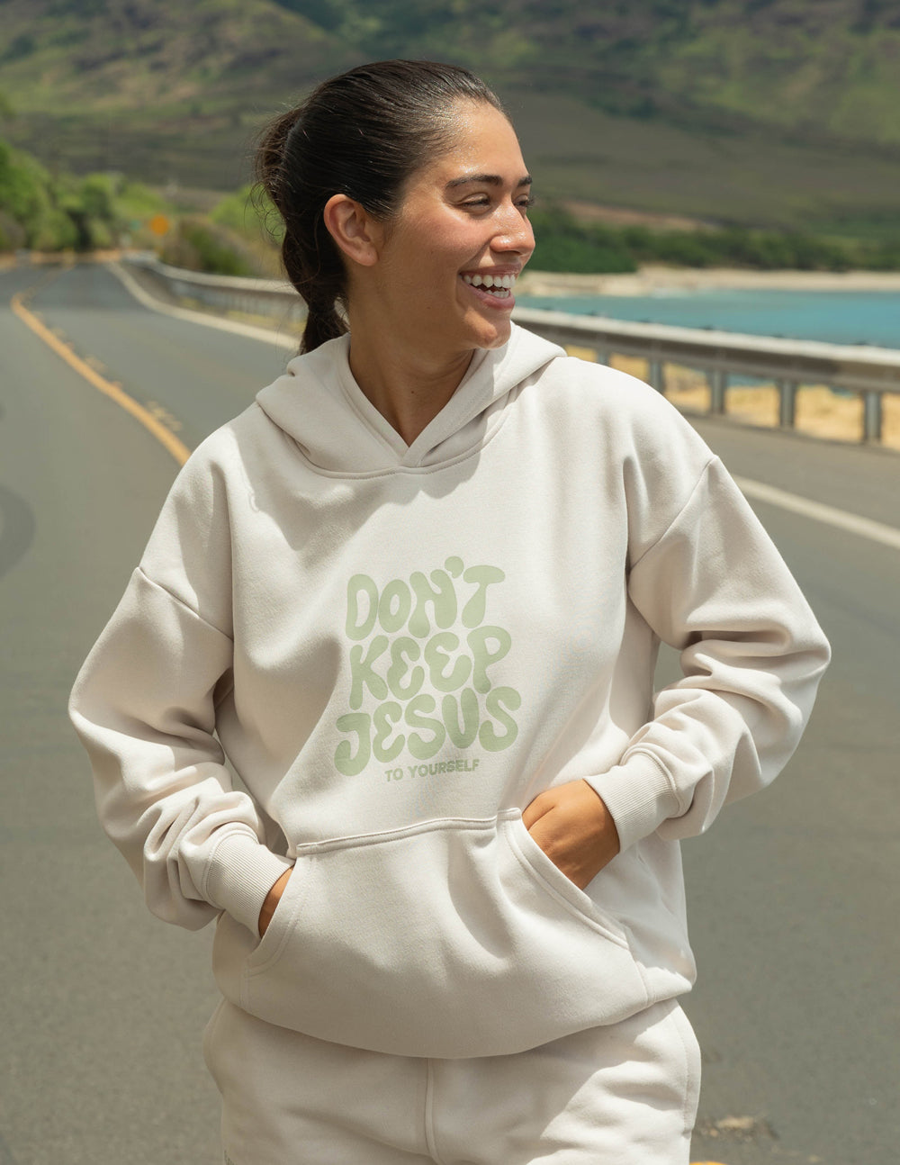 Unisex hoodie by Elevated Faith featuring the "Don't Keep Jesus to Yourself" design, shown in a comfortable, casual fit.