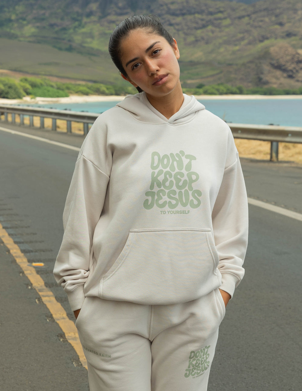 Unisex hoodie by Elevated Faith featuring "Don't Keep Jesus to Yourself" printed design on front, casual fit and comfortable fabric.