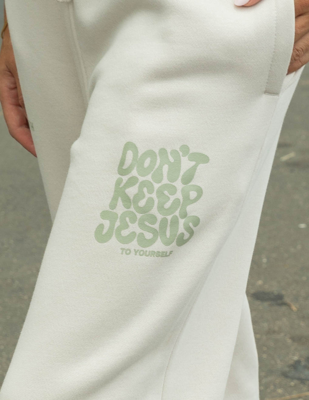 Unisex sweatpant by Elevated Faith with "Don't Keep Jesus to Yourself" printed design, comfortable fit and casual style.