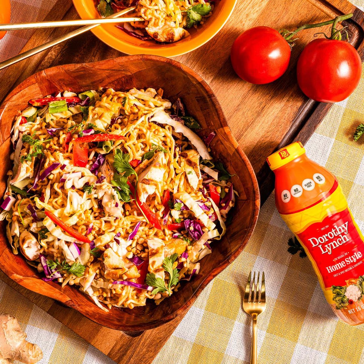 Homestyle Dorothy Lynch Salad Dressing bottle with peanut ramen salad in a bowl, gluten-free, 16 oz BuyNebraska.com food product