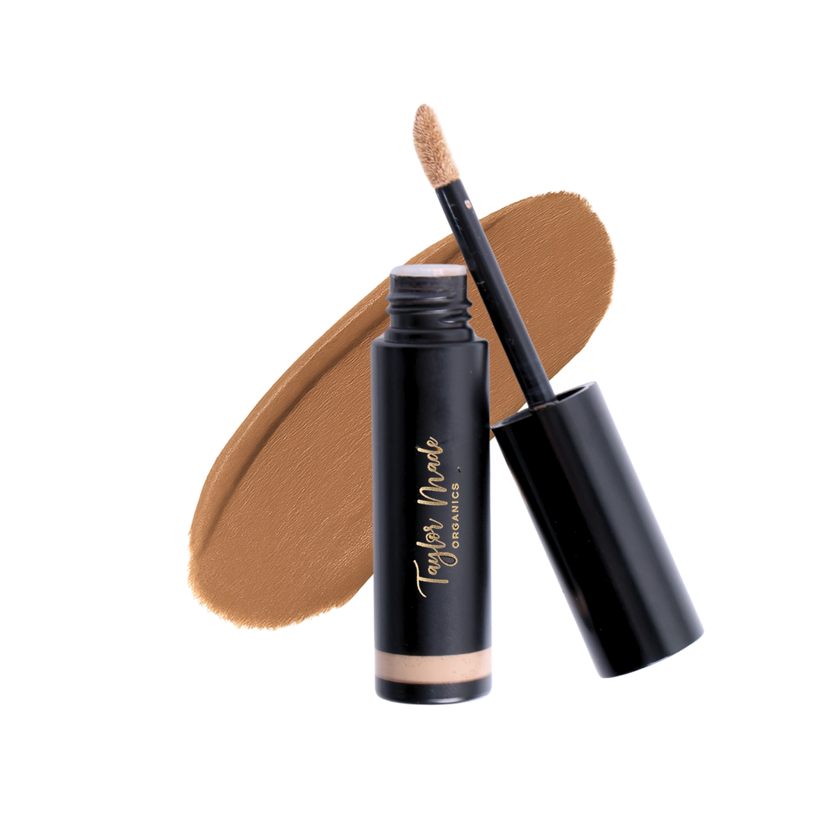 Taylor Made Organics liquid organic concealer with a smooth application and natural finish, shown in a sleek tube.