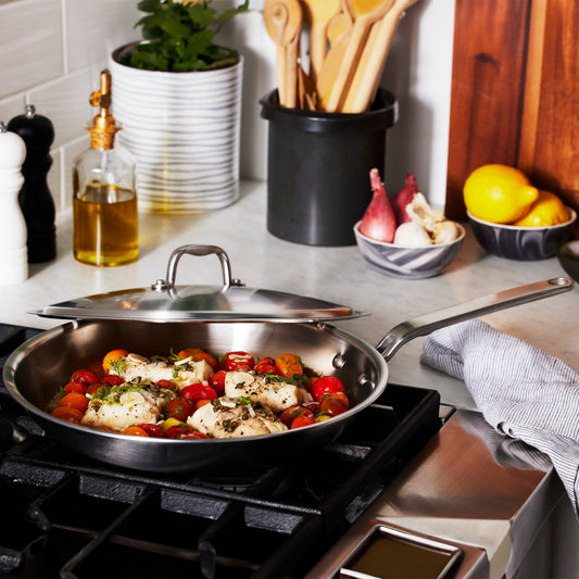 Heritage Steel 12-inch fry pan with lid, durable cookware made of stainless steel, suitable for versatile stovetop cooking.