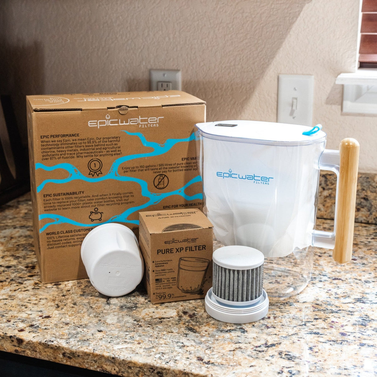 Epic Water Filters Pure XP pitcher with red lid, designed to reduce fluoride, PFAS, and parasites for clean drinking water.