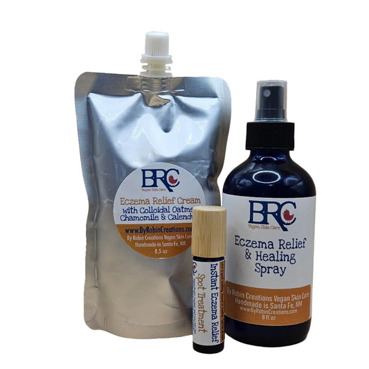 By Robin Creations eczema relief set with skincare products and free eczema spot treatment oil, displayed on a clean surface.