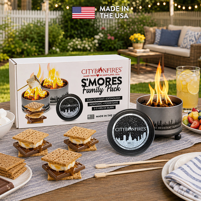 Family enjoying outdoor s'mores around a bonfire in a backyard, featuring City Bonfires S'mores Family Pack.