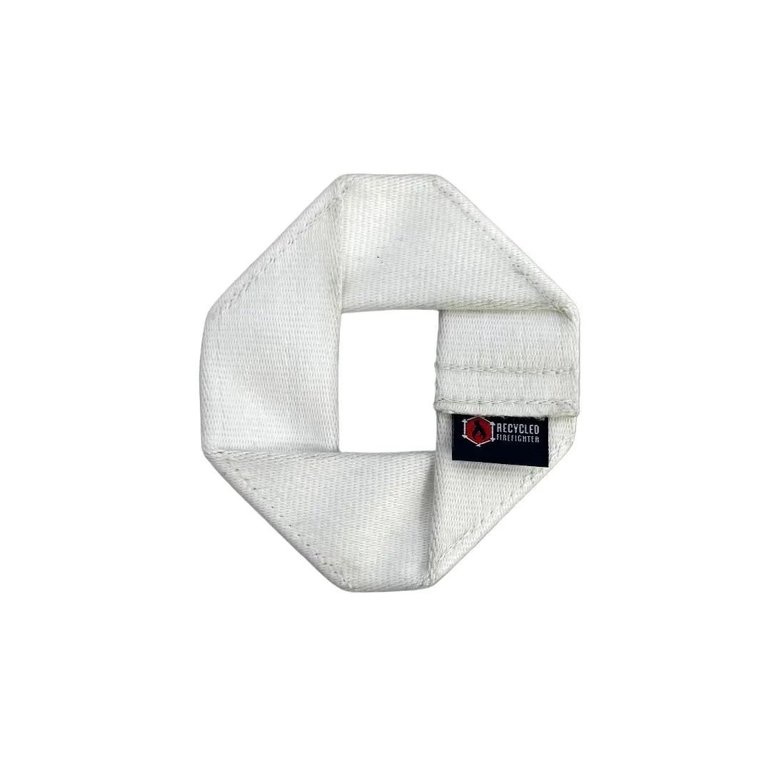 Recycled Firefighter Fire Hose Dog Frisbee JR, a durable white dog toy designed for fetch and outdoor play.
