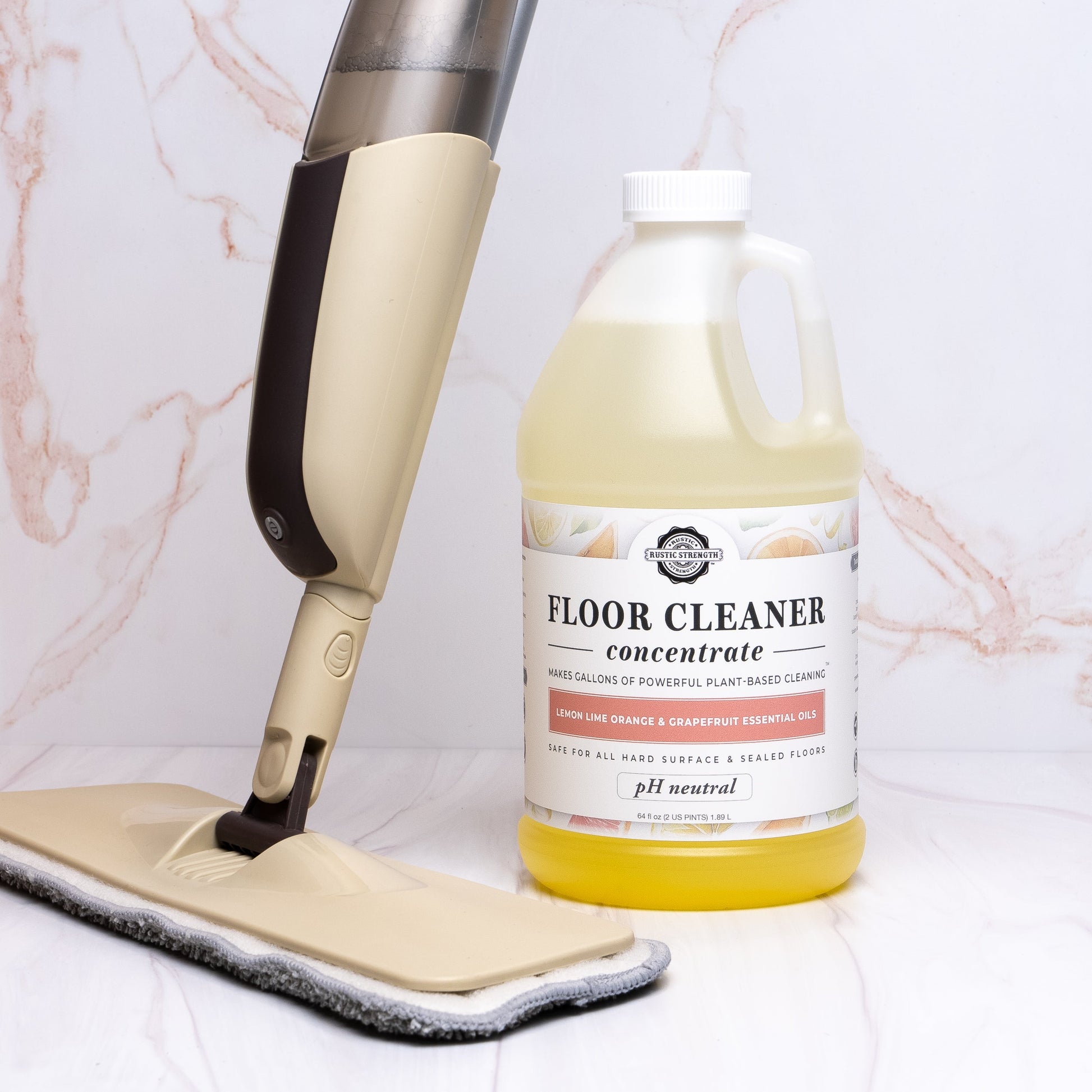 Rustic Strength lavender and lemon floor cleaner concentrate in a bottle, ready for mopping and deep cleaning floors.