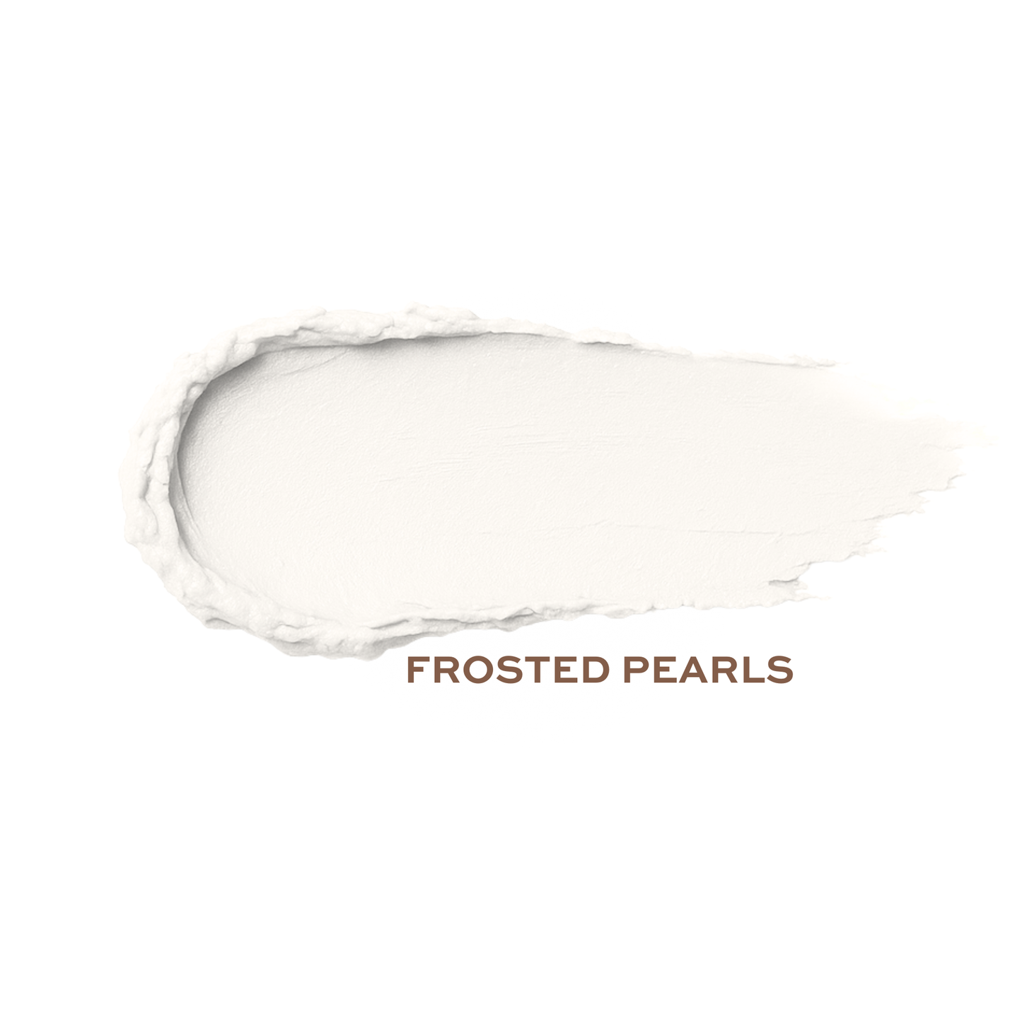Cream highlighter stick by Taylor Made Organics in Frosted Pearls shade, swatched on skin showing its luminous, pearly glow.