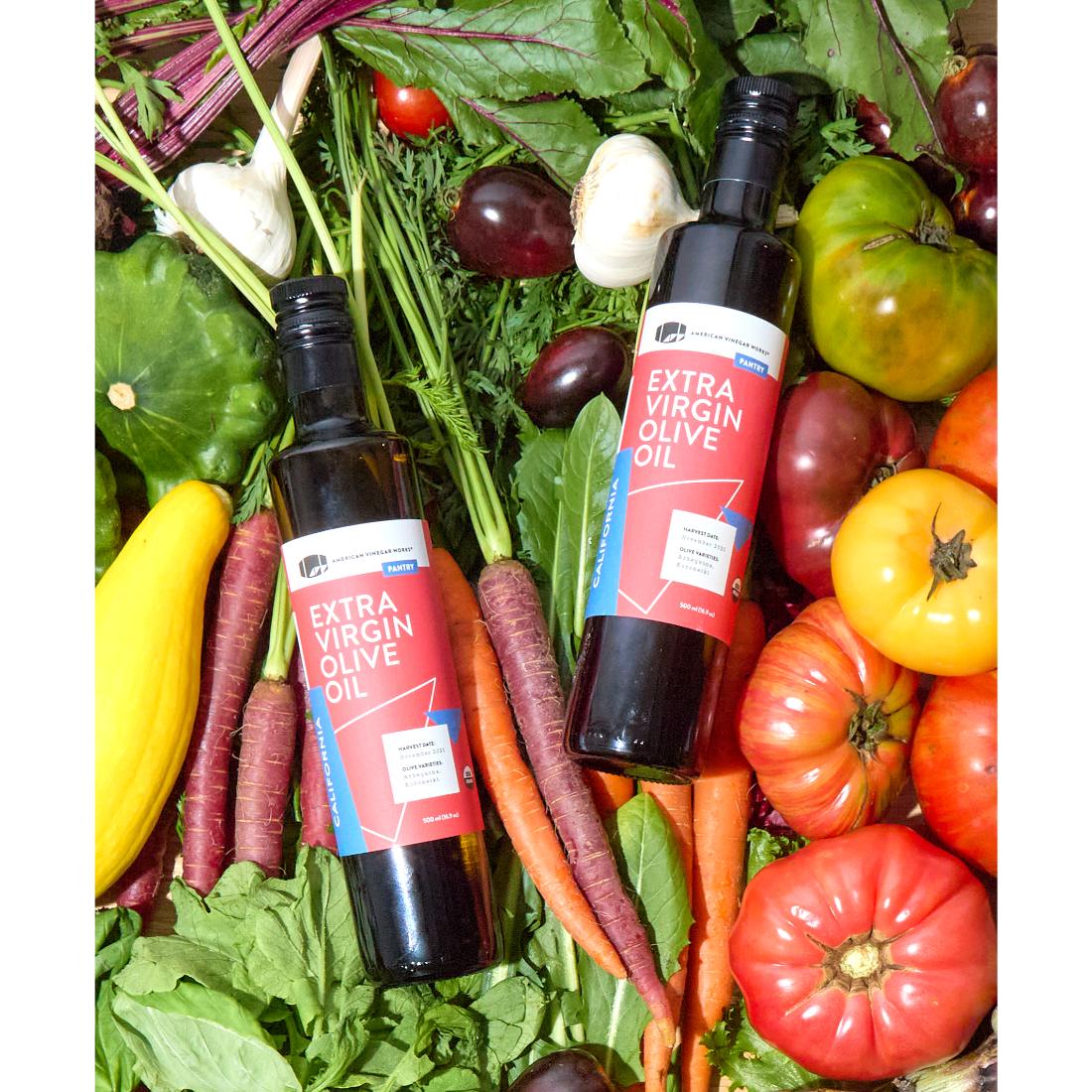 Premium California organic extra virgin olive oil in a glass bottle, showcasing its rich golden color and smooth texture.