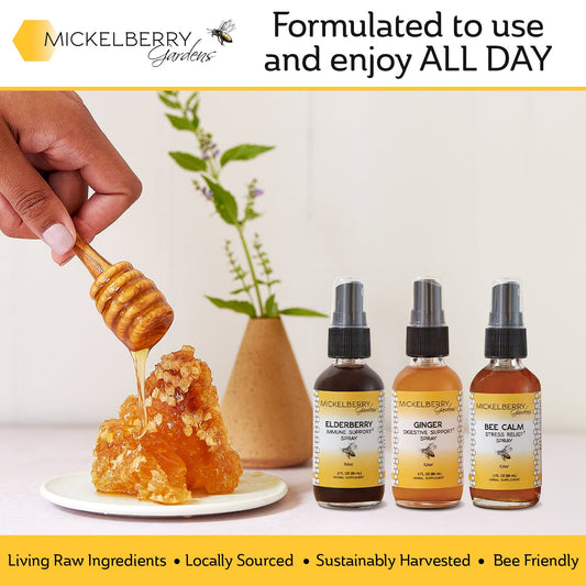 Mickelberry Gardens Honey Tonic Essential Gift Set with jars of honey and herbal infusions arranged in a gift box.