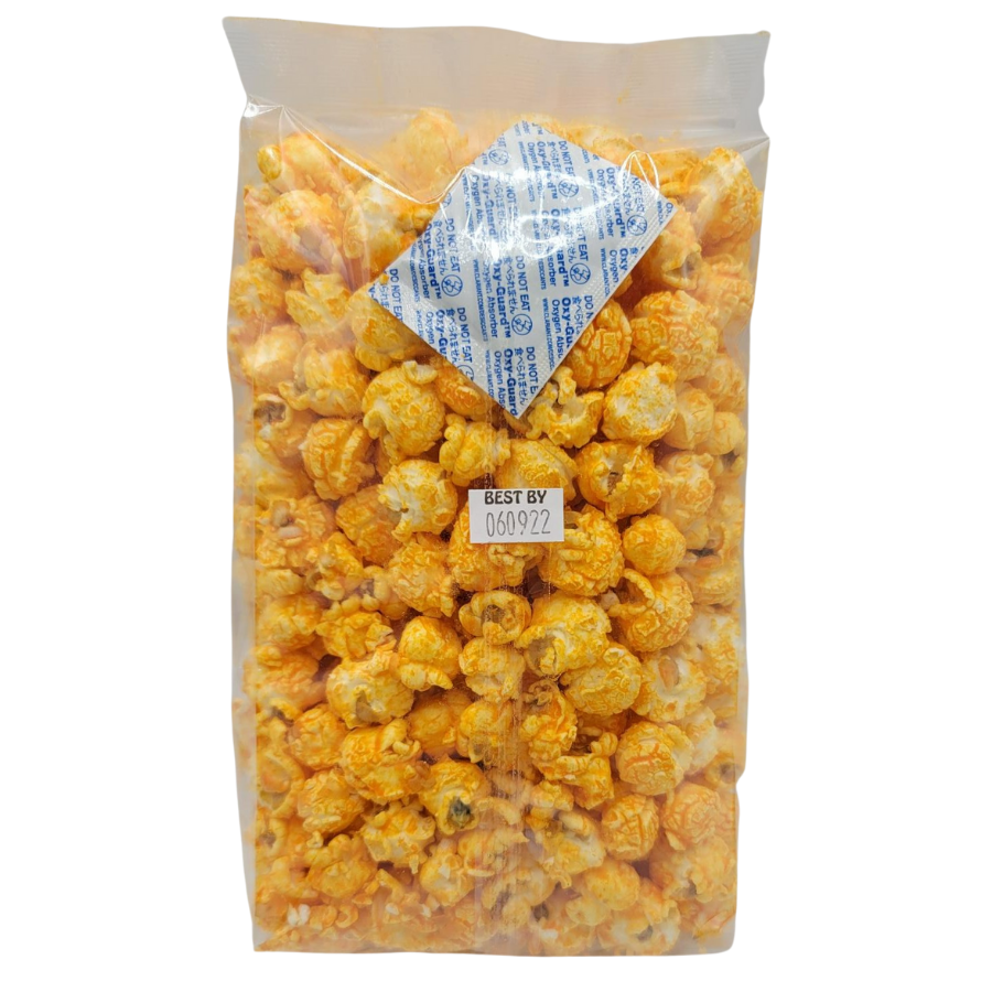 Bacon cheddar popcorn in a 3.5 oz bag from HR Poppin' Snacks, showing crispy popcorn coated with cheese and bacon flavor.