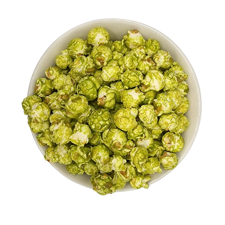 Green apple flavored popcorn in a 7 oz bag from HR Poppin' Snacks, vibrant green popcorn pieces on the packaging.
