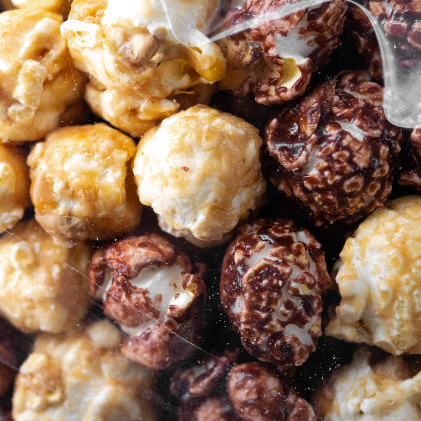 Peanut butter cup popcorn in a 7 oz bag from HR Poppin' Snacks, featuring crunchy popcorn coated with peanut butter cup flavor.