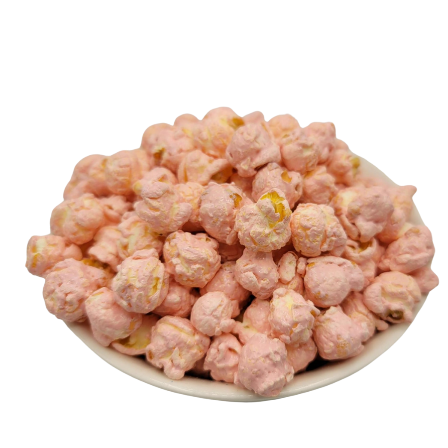 Pink marshmallow flavored popcorn in a clear bowl, showcasing It's A Girl themed packaging from HR Poppin' Snacks, 84 servings.
