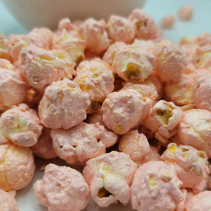 Pink marshmallow-flavored popcorn from HR Poppin' Snacks, featuring It's A Girl theme, in a large serving size.