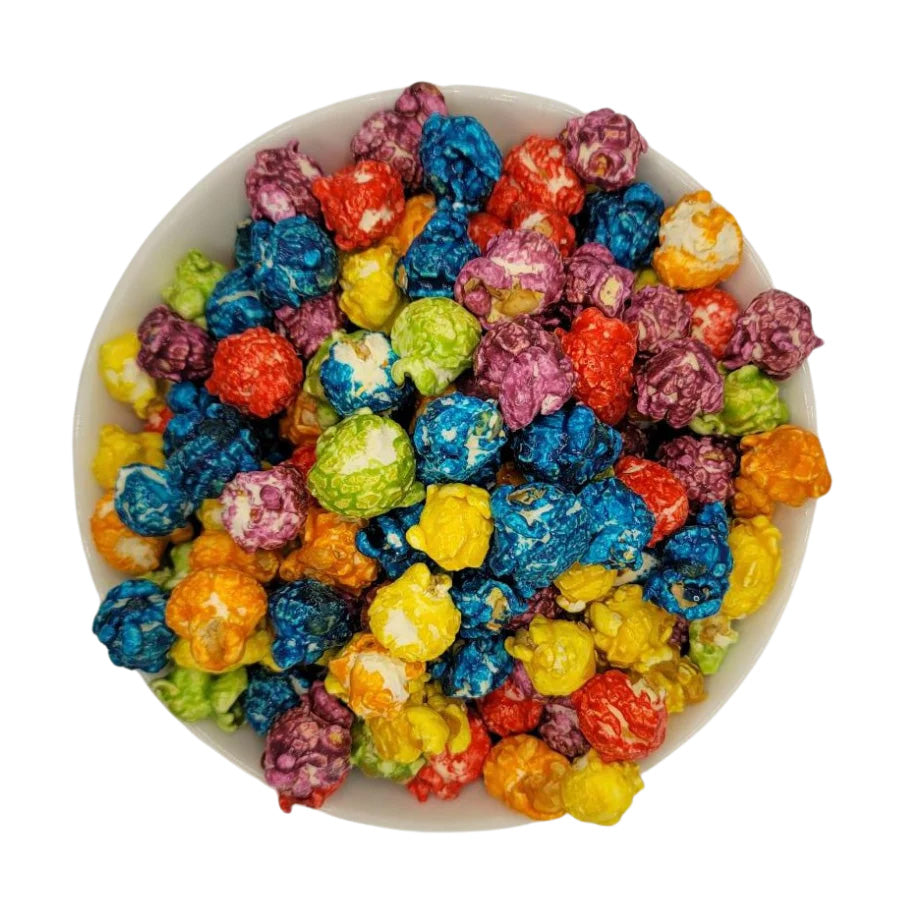 Colorful rainbow popcorn in a bowl, showcasing bright, multicolored snack pieces from HR Poppin' Snacks, perfect for food lovers.