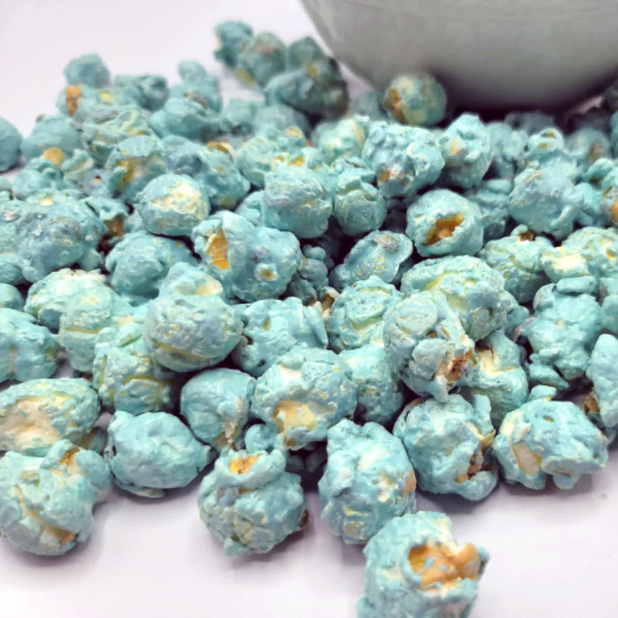 Blue marshmallow flavored popcorn from HR Poppin' Snacks, 84-serving bag, featuring colorful popcorn pieces for a sweet treat.