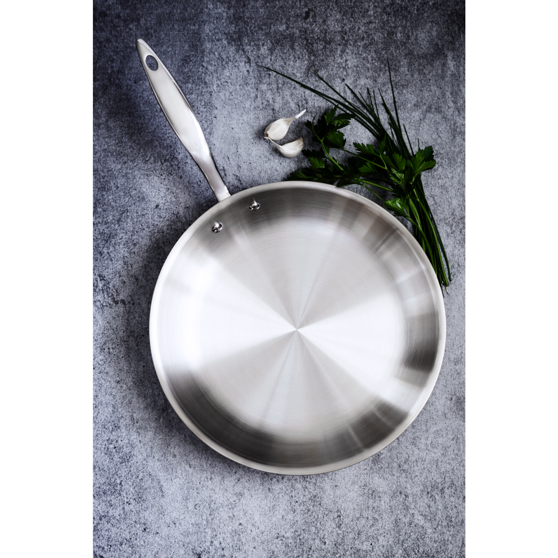Heritage Steel Titanium Series 12-inch fry pan with lid, durable cookware for versatile cooking and even heat distribution.