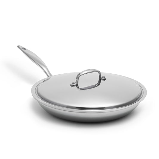Heritage Steel Titanium Series 12-inch fry pan with lid, showcasing a sleek cookware set on a stovetop.