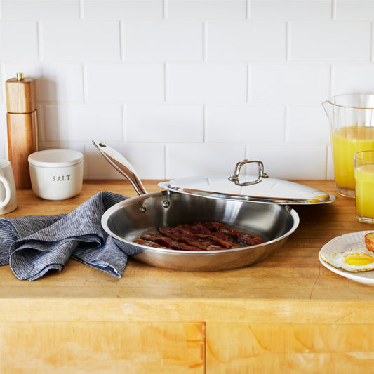 Heritage Steel Titanium Series 12-inch fry pan with lid, durable cookware with a non-stick surface and handle.