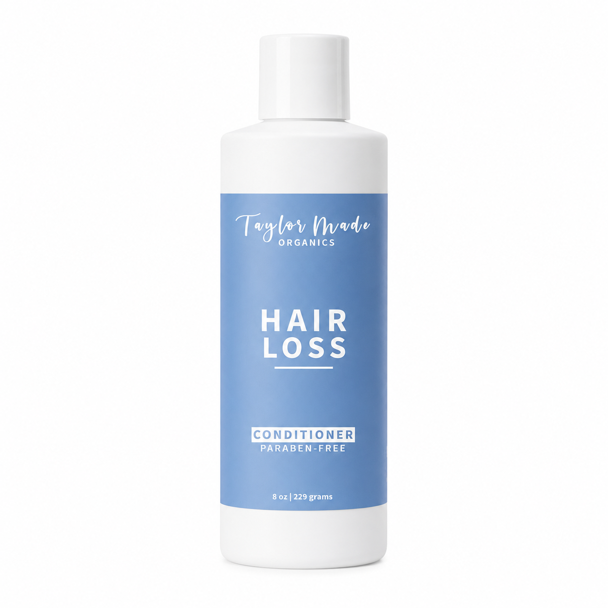 Organic hair loss conditioner with silk protein by Taylor Made Organics, showing creamy formula and silk infusion in a hair care bottle.