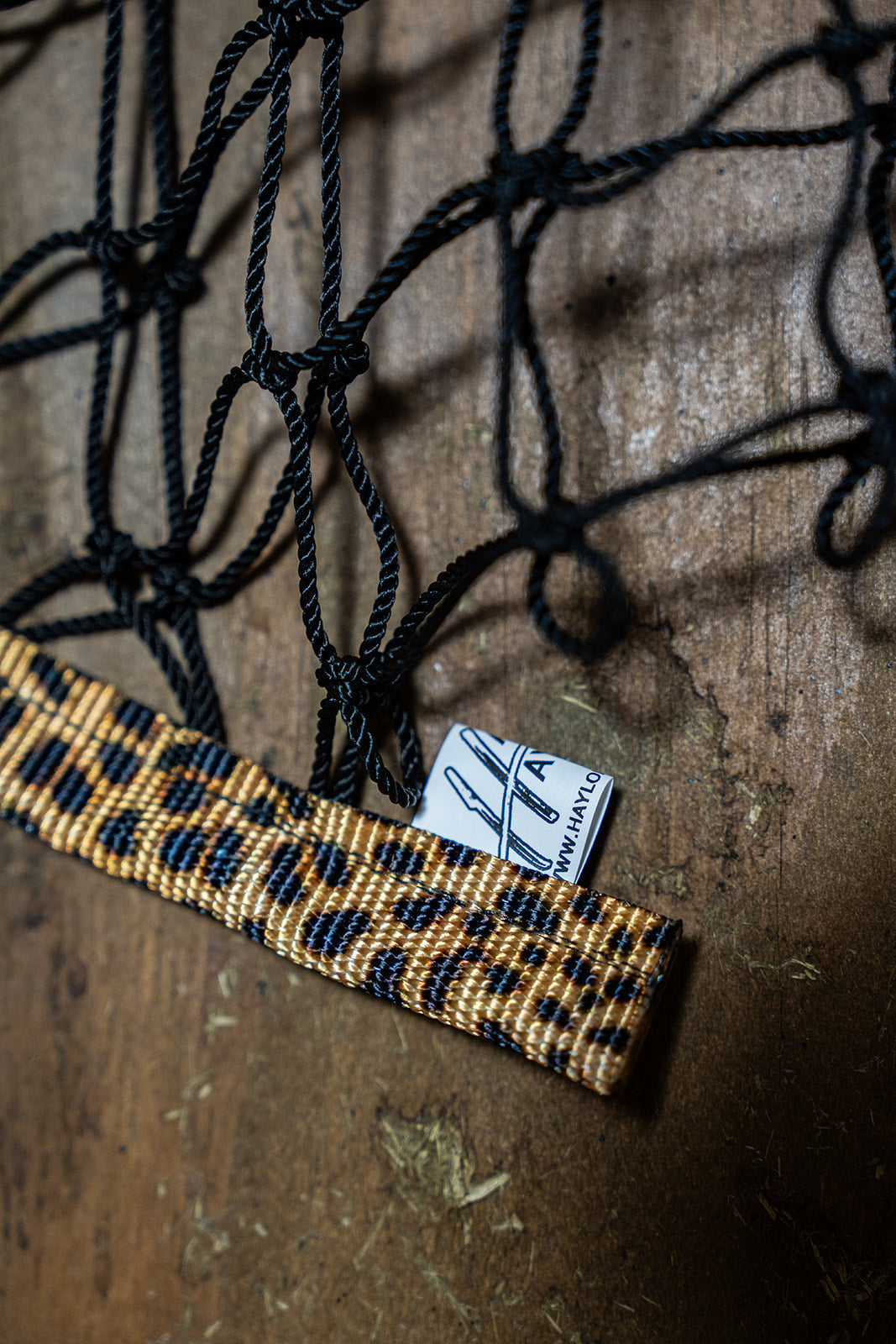 Limited edition leopard print haynet from Haylo Haynets, LLC, featuring a durable, woven design for safe horse feeding.