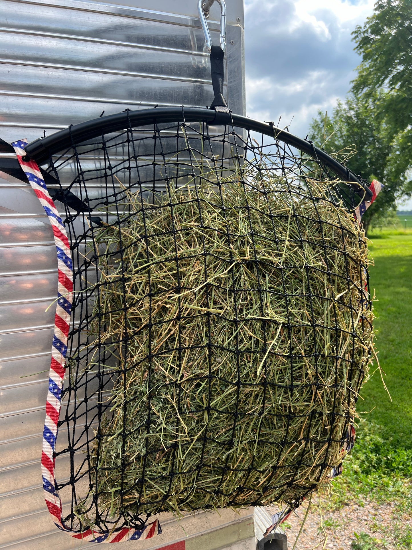 Limited edition Haylo Haynets Patriot design, durable hay net for horse feeding with patriotic print and mesh sides.