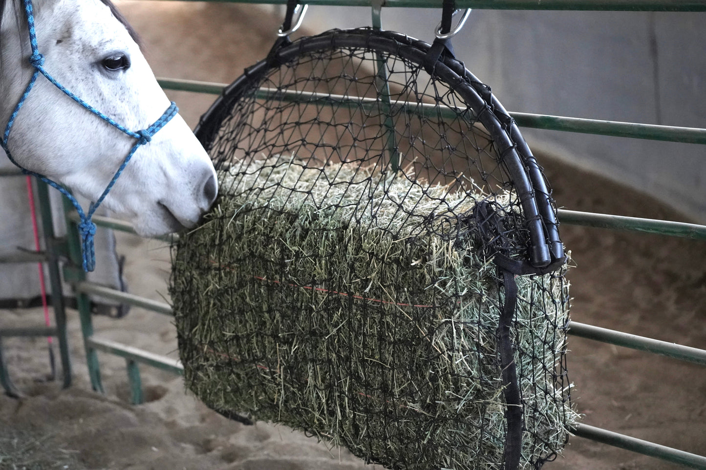 Square bale net from Haylo Haynets, LLC, showing a close-up of the durable netting wrapped around a square hay bale.