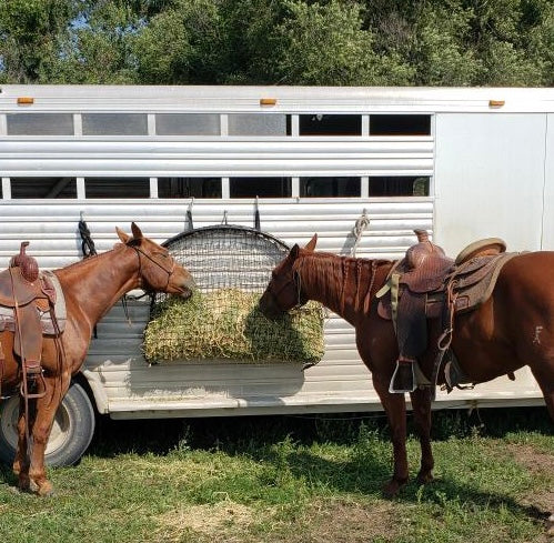 Square bale net from Haylo Haynets, LLC in use, wrapping a hay bale to keep hay fresh and secure during storage.