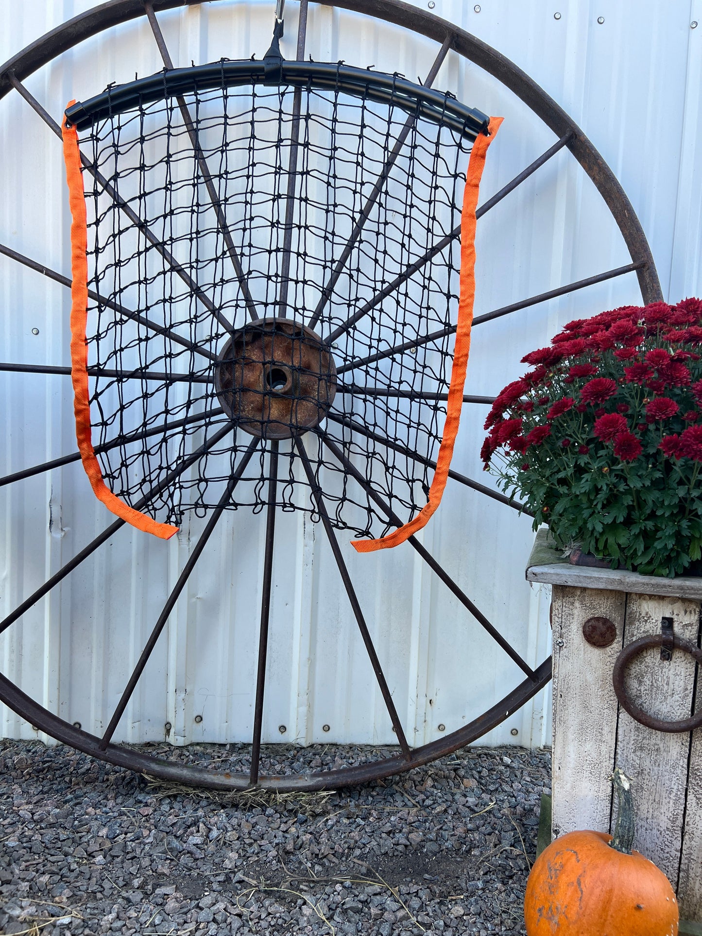 Limited edition orange haynet from Haylo Haynets, LLC, showing a sturdy rectangular haynet with a bright orange color.