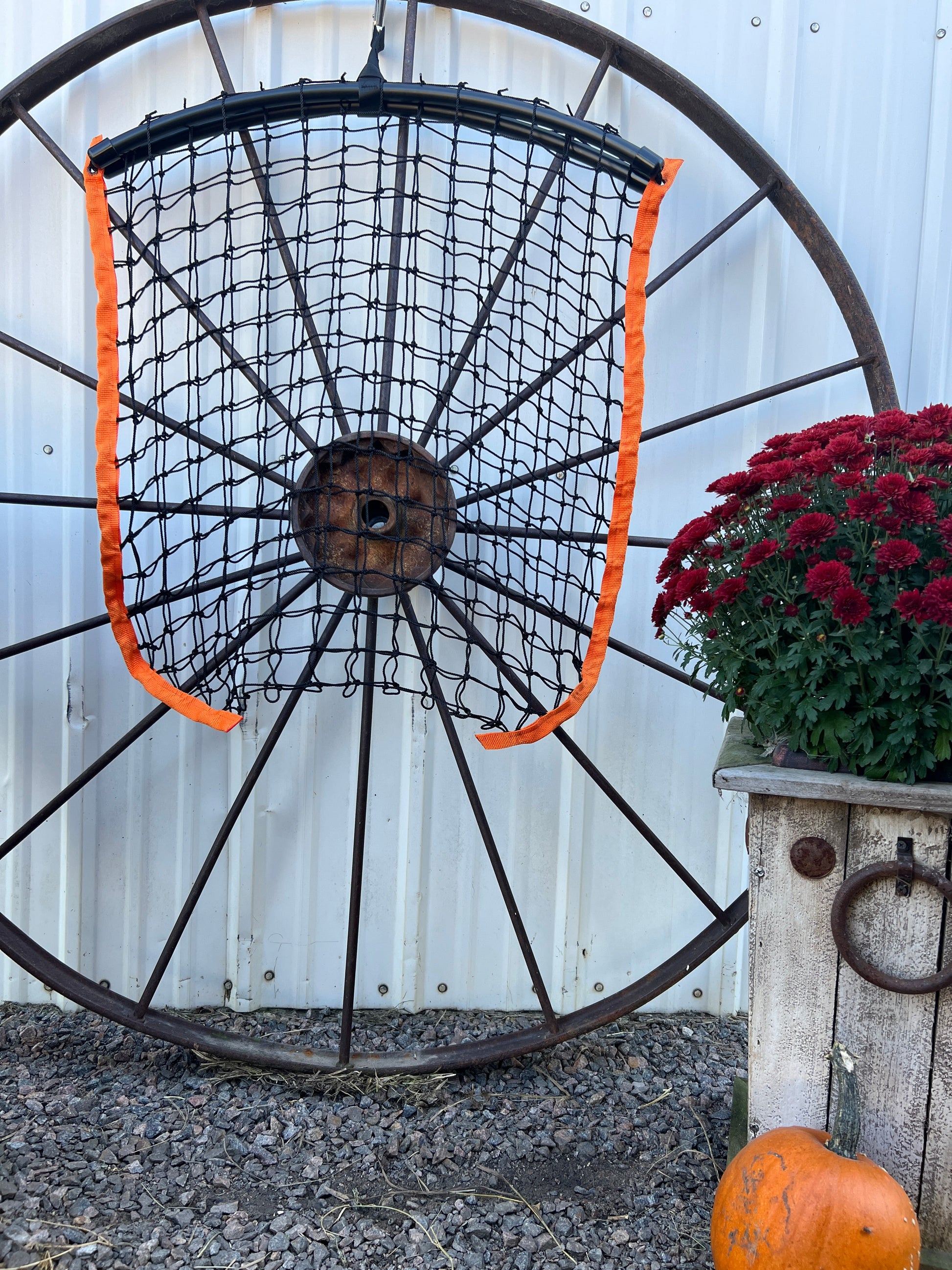 Limited edition orange haynet from Haylo Haynets, LLC, showing a sturdy rectangular haynet with a bright orange color.