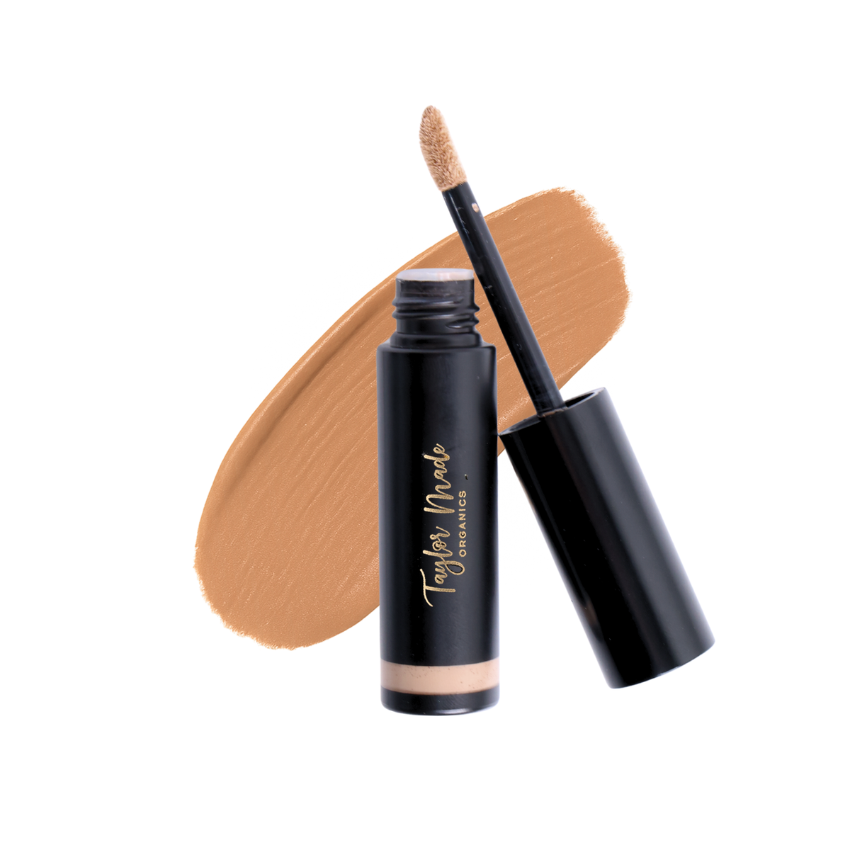 Hazel liquid organic concealer from Taylor Made Organics, swatched on skin showing its smooth, natural finish and creamy texture.