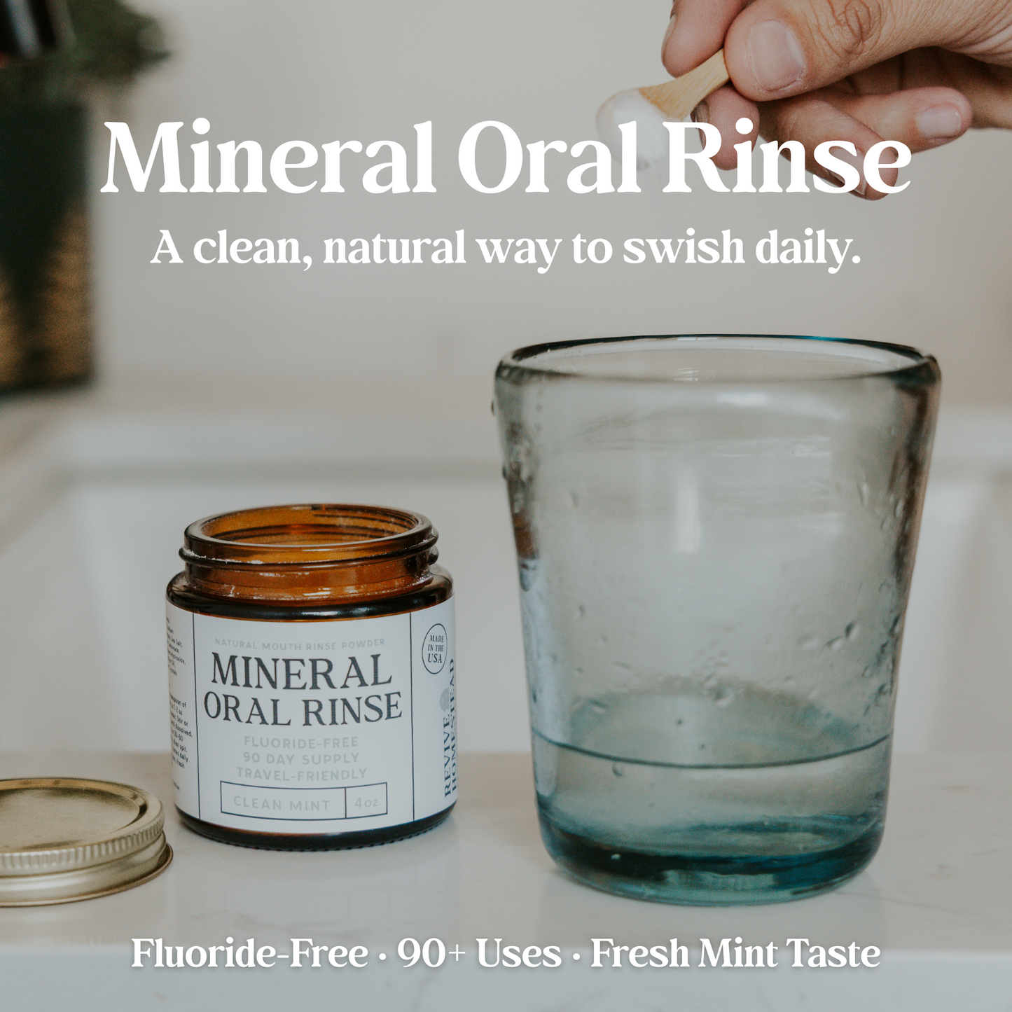 Natural Oral Rinse by Revive Homestead in a clear bottle with a white cap, showcasing fresh herbal ingredients for oral care.