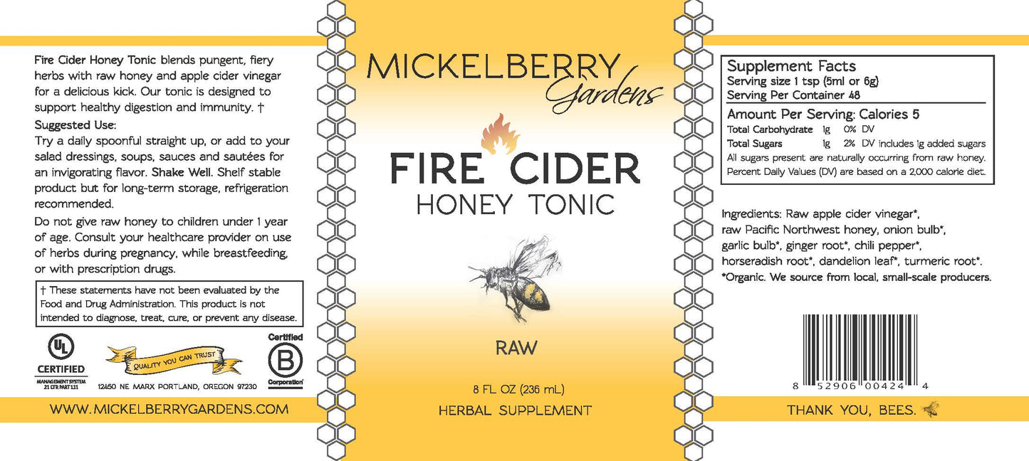8oz bottle of Mickelberry Gardens Fire Cider Honey Tonic with raw honey and spicy ingredients in a clear glass bottle.