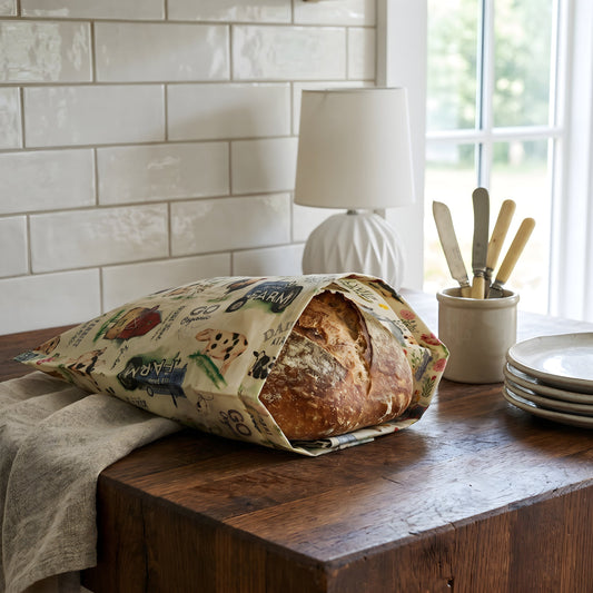 Beeswaxed bread bag from Five Oaks Farm, natural fabric with beeswax coating, designed for storing fresh bread.