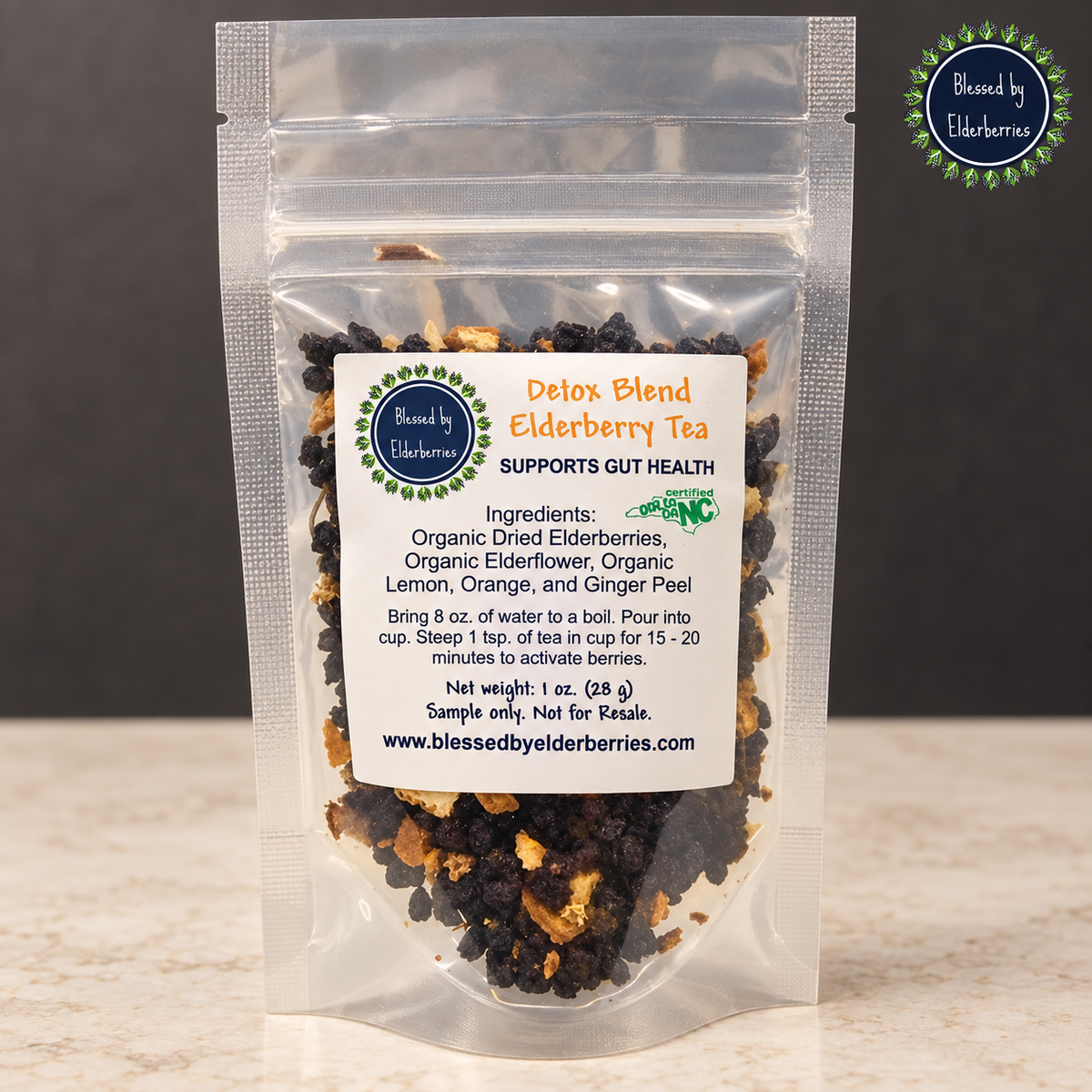 Dried elderberries in a jar for Blessed by Elderberries Detox Blend Elderberry Tea and herbal tea infusions.