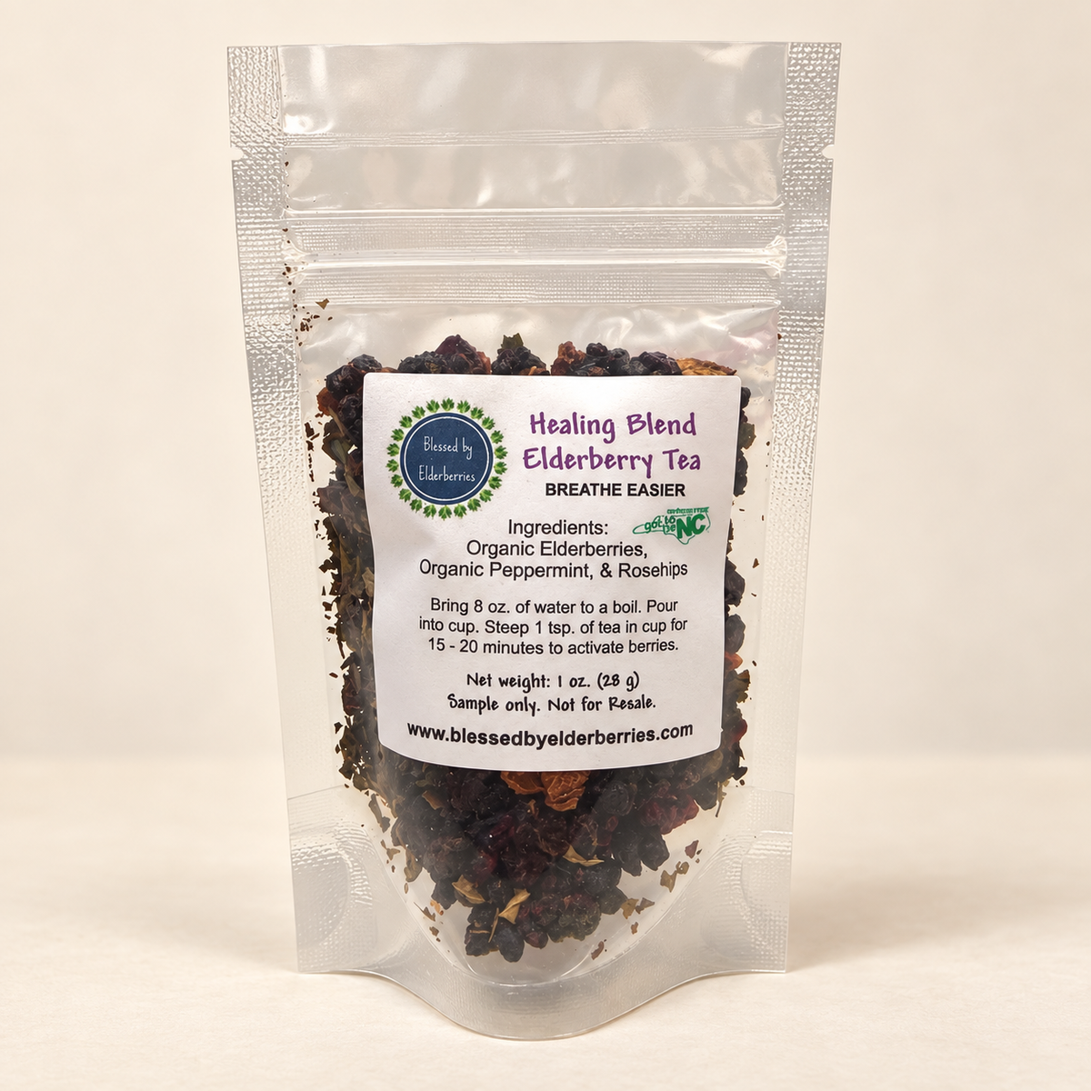 Healing blend Elderberry tea by Blessed by Elderberries in a tea bag with dried elderberries and herbs, ready for brewing.