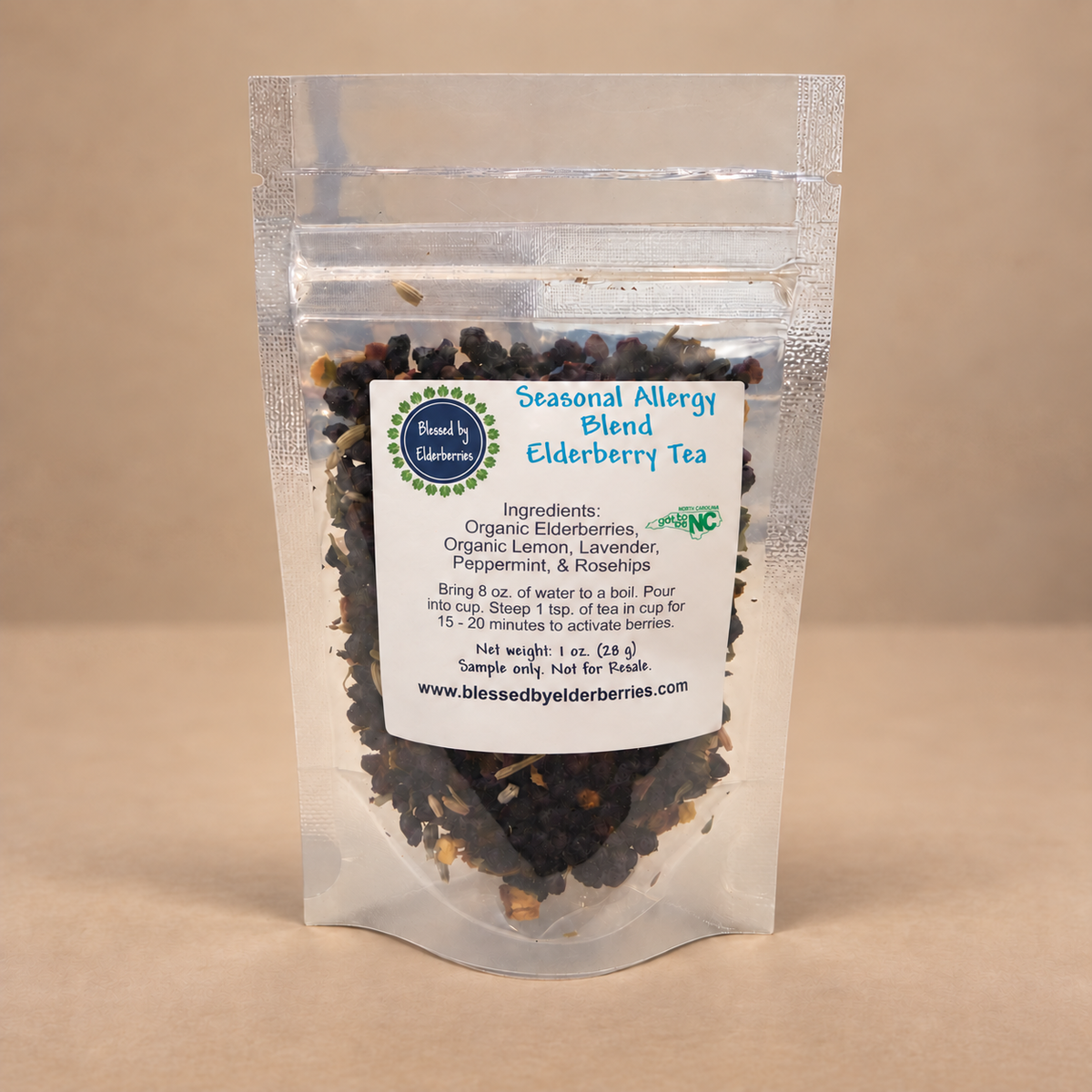 Loose leaf Elderberry Tea from Blessed by Elderberries, seasonal allergy blend with dried elderberries and herbs in a clear jar.