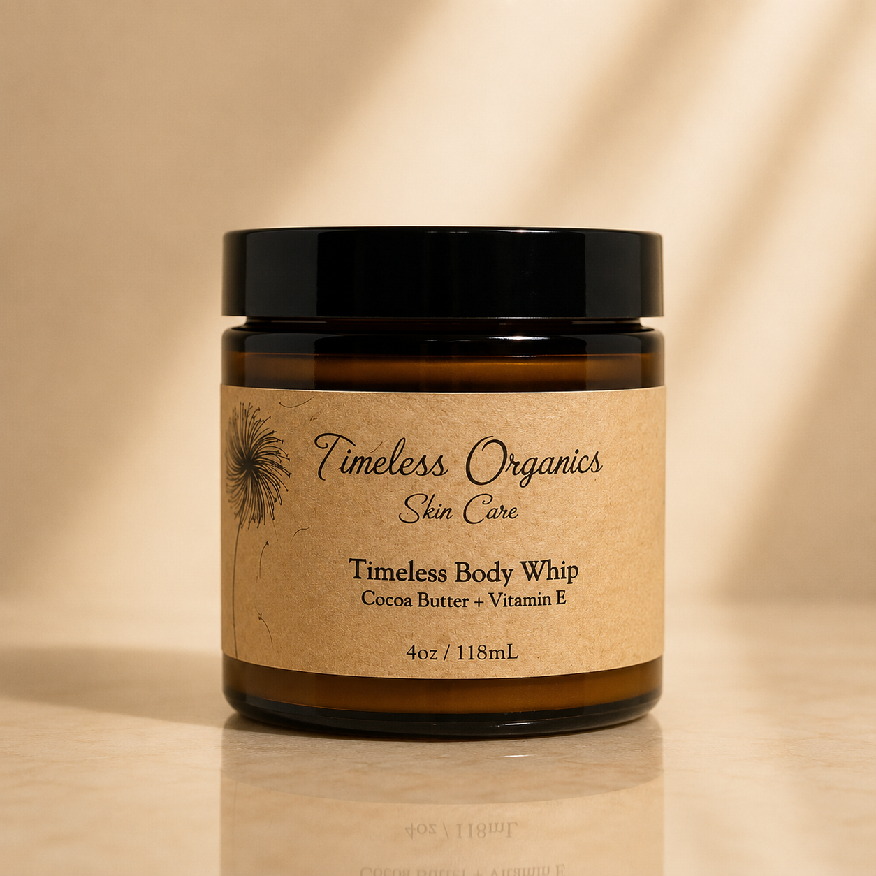 Timeless Organics Skin Care Body Whip lotion with cocoa butter and vitamin E, showing a smooth, luxurious cream in a jar.