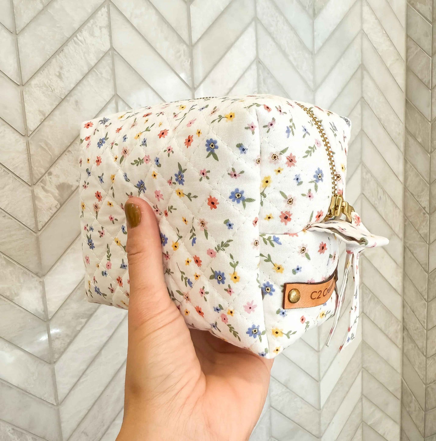 Handmade boxy makeup bag by C2 Creations LLC featuring a Wildflower Meadow pattern, stylish toiletry storage with floral design.
