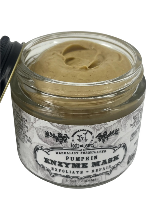 Roots and Leaves LLC Pumpkin Enzyme Face Mask in a jar, showcasing natural pumpkin-based skincare with enzyme-rich formula.