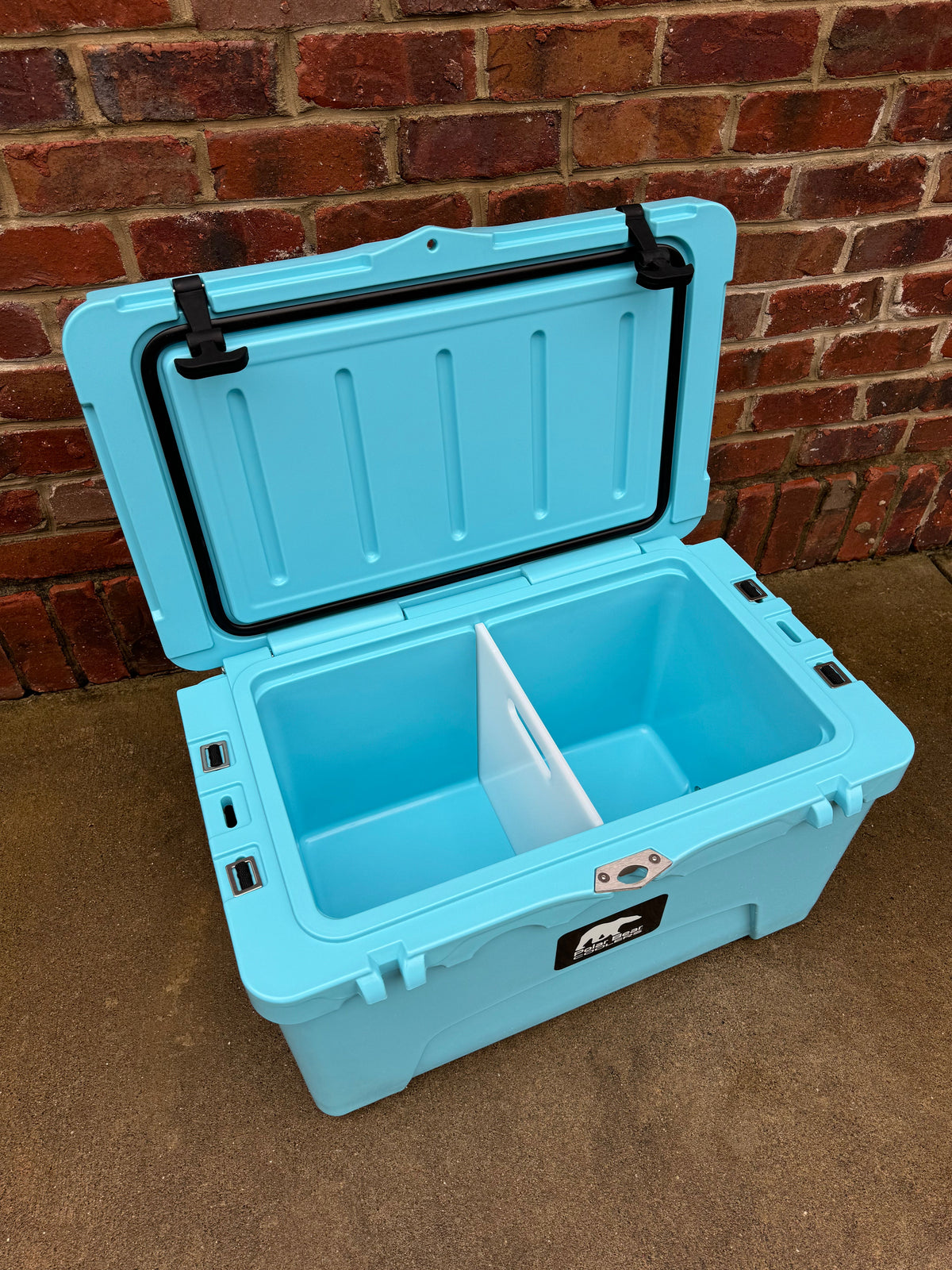 Polar Bear 45 Hard Cooler by Polar Bear Coolers, featuring sturdy construction and a secure lid, ideal for outdoor cooling needs.