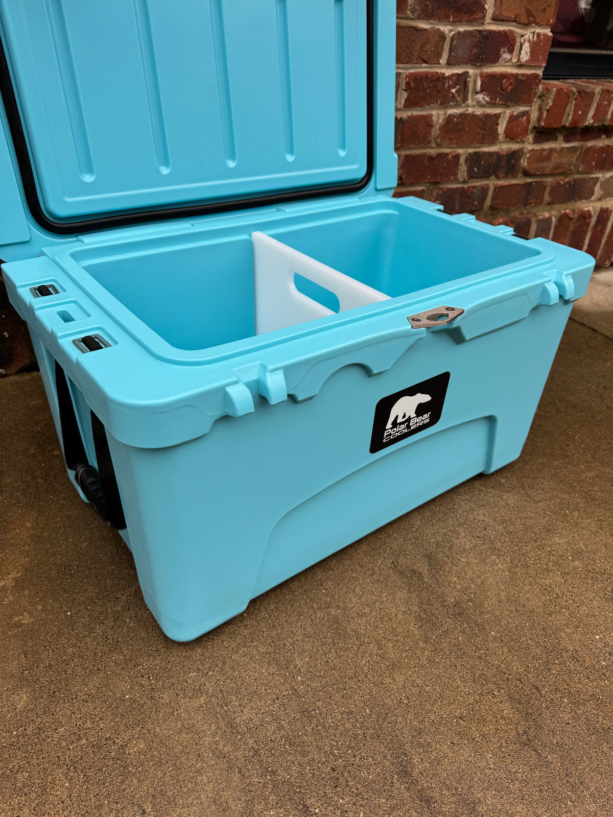 Polar Bear 45 Hard Cooler by Polar Bear Coolers with sturdy design and secure lid, ideal for outdoor cooling needs.